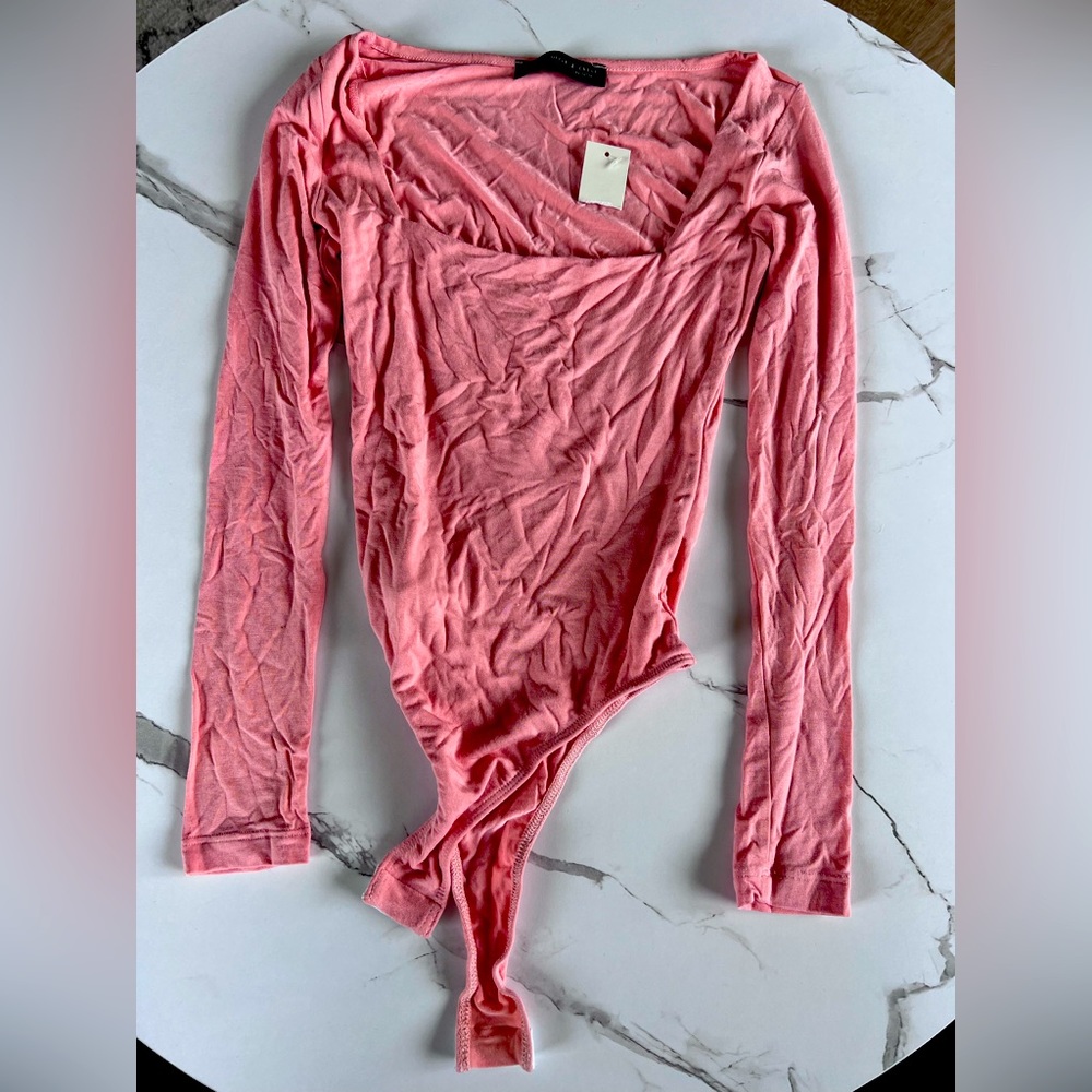 Francesca's Collections Pink Long Sleeve Bodysuit